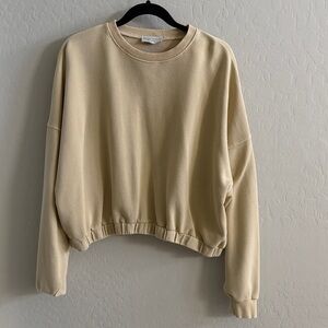 Dress Forum Light Beige or light yellow sweatshirt with elastic waistband